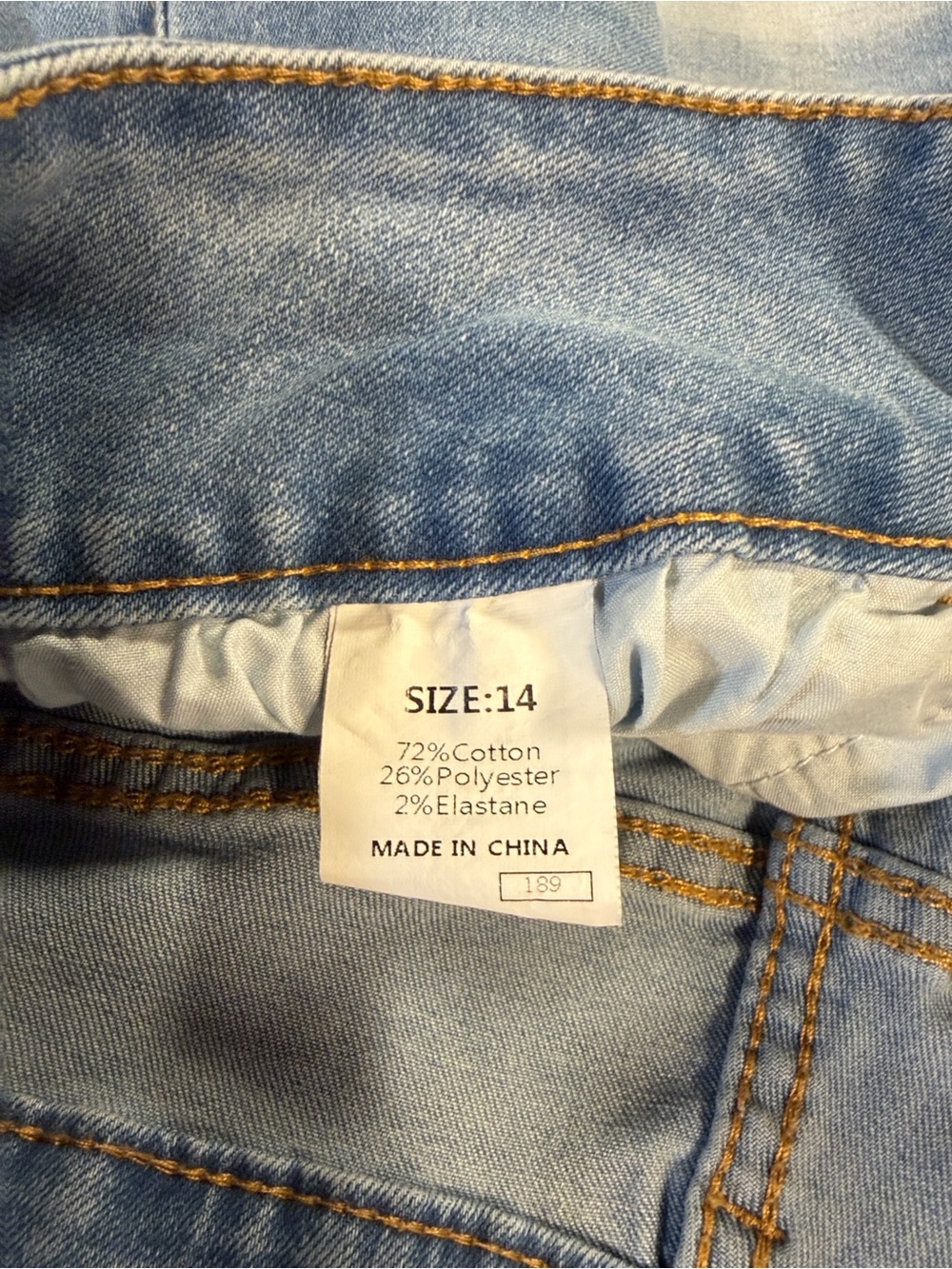 High-Rise Light Blue Denim Shorts with Frayed Hem - Picture 10 of 10